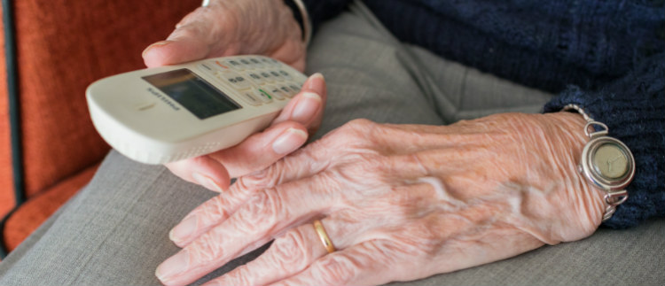 Elderly Woman Answering Phone