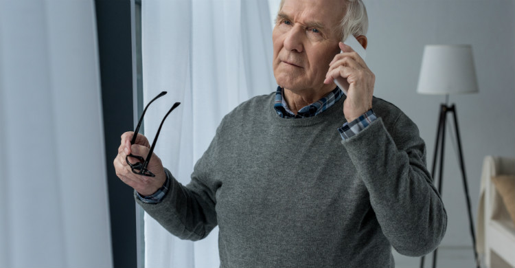 Old Man Talking On Phone